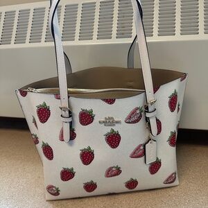 Coach Mollie tote with strawberry print